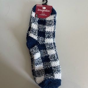 Blue and white fuzzy/fluffy socks. One size fits all